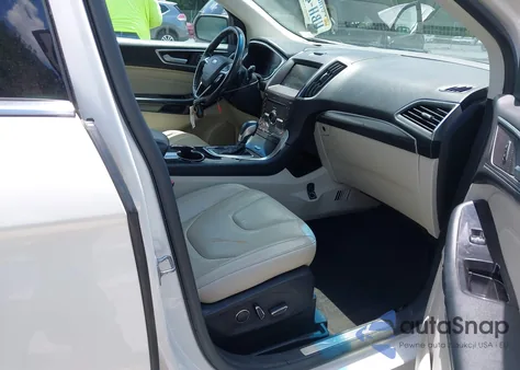 2015 Ford Edge Titanium z USA, uszkodzony, nr VIN 2FMTK3K91FBB46611